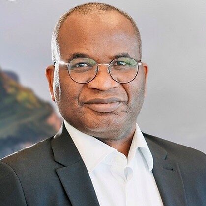 Uche Ezetah headshot, smiling